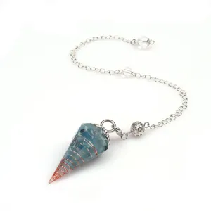 Crystal resin cone pendulum detail shot, copper wire wrapped gemstone dowsing crystal necklace.