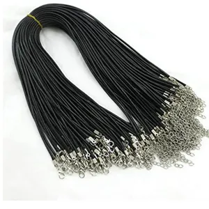 Detail shot of black faux leather cord necklaces with silver lobster clasps for DIY jewelry.