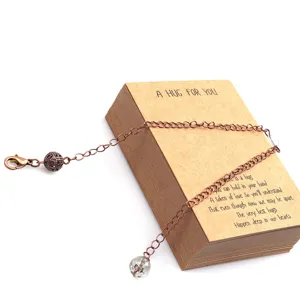 Kupferfarbe DIY Ketten Schmuck Zubehör mit Hohlperle und klarem Pendel Anhänger Karte.