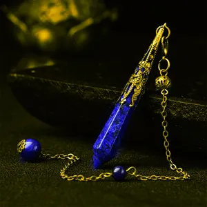 Blue crystal stone pendulum pendant with bronze filigree chain detail for meditation yoga.