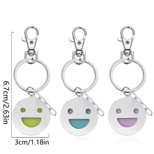 Porte-clés visage souriant tendance, accessoires de pendentif en métal élégants pour sacs.