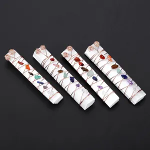 Natural selenite crystal stick wrapped with copper wire and 7 chakra stones for healing decor.