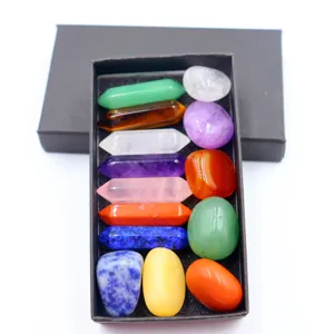 Natural crystal gemstone gift box set including hexagonal columns and tumbled stones for decoration.