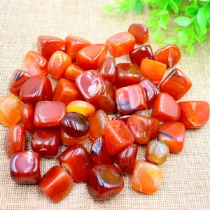 Natural carnelian tumbled stones, irregular polished crystal gems for yoga, home decor, and crafts.