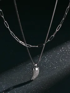 Detailed shot of double layer men stainless steel necklace set with paved zircon horn pendant.