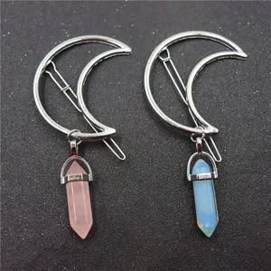 Close-up detail of crescent moon hexagonal crystal hair clips set, alloy geometric hairpins.
