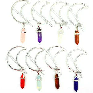 Detail view of crystal moon hair clips, featuring various gemstone hexagonal pendants and alloy.
