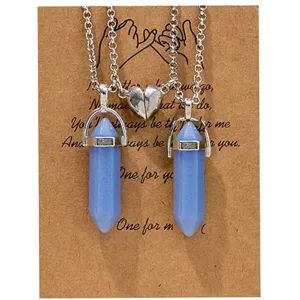 Couple magnetic hexagonal crystal stone pendant necklace paired with a warm greeting card.