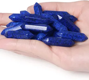Lapis lazuli double terminated hexagonal crystal pillars raw gemstone polished craft details.