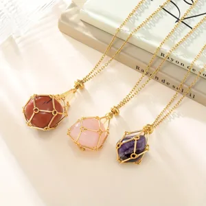 Detail view of natural crystal raw stone cage pendant necklaces with adjustable golden chains.