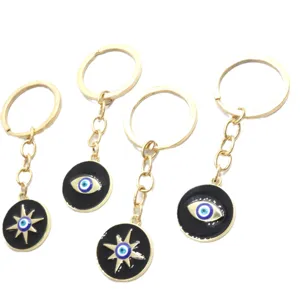 Lot de 4 porte-clés œil turc bleu, anneaux de clés en alliage doré et charmants pendentifs.