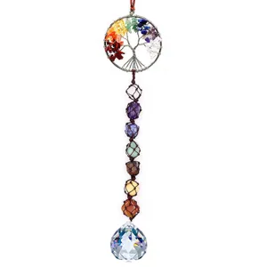 Handmade crystal tree of life car hanging ornament with chakra stones and suncatcher sphere.