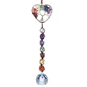 Crystal tree of life detail showing multi-color natural gemstone chips and faceted crystal ball.