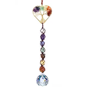Crystal suncatcher detail showing the heart tree of life and chakra stones hanging ornament.