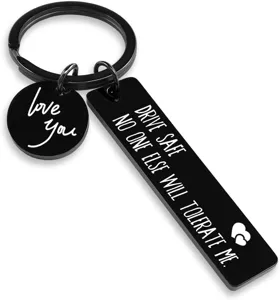 Stainless steel engraved keychain with love you and drive safe text for couples and drivers.