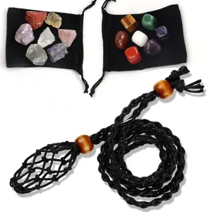 Natural crystal stones set with woven necklace holder for chakra healing and meditation yoga.