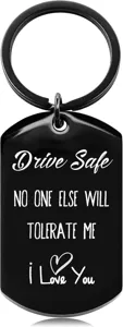 Black stainless steel dog tag keychain engraved with romantic driving quote and heart.