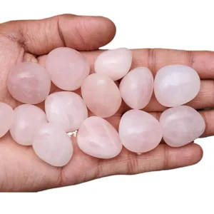 Natural rose quartz tumbled stones healing crystals for home decor, yoga, and meditation use.