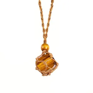 Handmade woven rope cage necklace detail showcasing natural gemstone block and wooden bead.