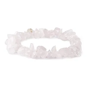 Close-up detail view of natural irregular crystal chip bracelet featuring polished pink stones.