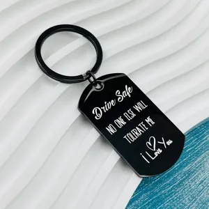 Stainless steel keychain engraved with Drive Safe love you text design detailed view.