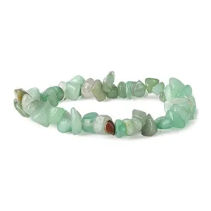 Natural green crystal chip stretch bracelet detail shot, showing irregular polished stone beads.