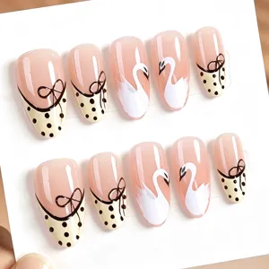Almond press-on nails nude pink French polka dot bow swan elegant fake nail art details