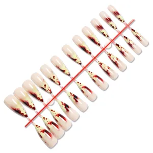 Faux ongles press-on au design de sang, ensemble de bouts d'ongles pointus et longs pour femmes.