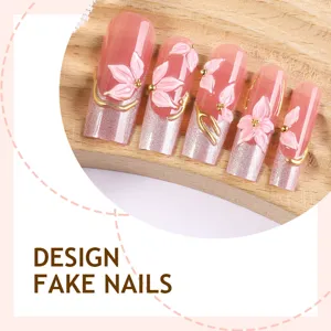 Faux ongles carrés moyens ornés de fleurs roses 3D, de paillettes et de lignes dorées.