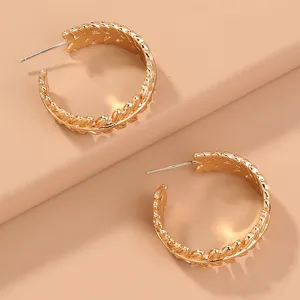 Gold tone leaf shaped C hoop earrings for women, trendy metallic fashion jewelry.