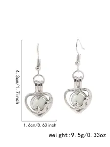 Pendientes colgantes de zorro con corazón hueco plateado y cuenta luminosa, joyería de moda.