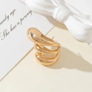 Chic gold geometric multi-layer spiral drop earrings minimalist trendy design detail shot
