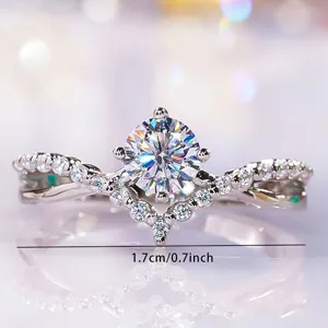 Stunning silver copper zirconia ring with a sparkling central stone and elegant V-shaped pave.