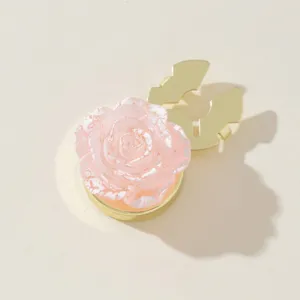 Pink resin rose button cover for shirt cuffs, elegant floral cuff link accessory and collar decor.
