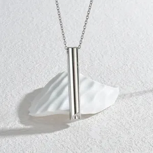 Stainless steel anxiety relief whistle pendant necklace for daily meditation use.