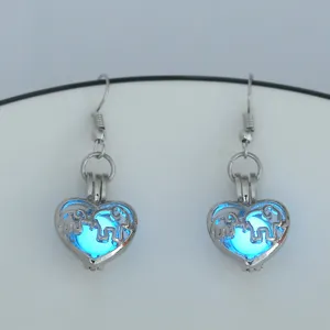 Leuchtende Elefant Herz Käfig Ohrringe Detail, blaue Nachtleuchtende Perle Legierung Schmuck.