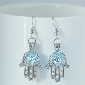 Silberne Hamsa Hand leuchtende Ohrringe boses Auge blaue Kugel Cage Ohrhaenger Schmuck