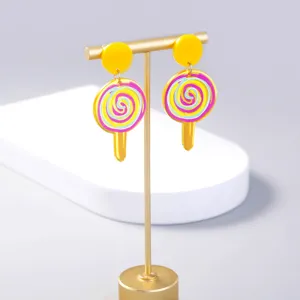 Colorful swirl lollipop dangle earrings detail shot, sweet candy design jewelry for women.