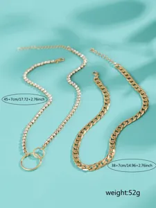 Set di collane con catena tennis in strass e catena gourmette con doppi anelli dorati.