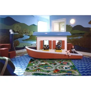 Kids city traffic map play rug detail showing cute streets and buildings for baby room decor.