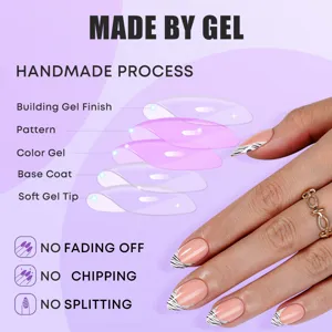 Short almond press-on nails with chic zebra French tip design and handmade gel quality.