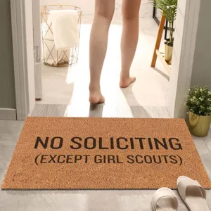 Funny coir doormat with novelty text for front door, durable welcome mat for home entrance.