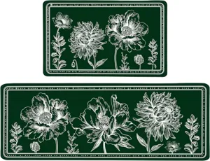 Dark green floral kitchen mat detail showing elegant white line art and inspirational text border.