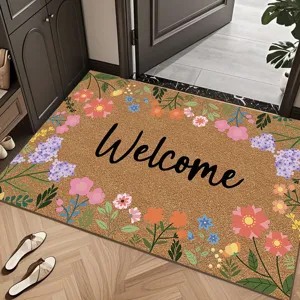 Paillasson en coco Welcome avec bordure florale colorée pour entrée porte intérieure.
