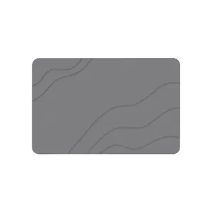 Grey diatomaceous earth bath mat with wave design non-slip absorbent floor mat for bathroom.
