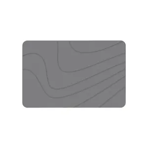 Grey diatomaceous earth bath mat, non-slip absorbent floor rug with modern wave stripe pattern.