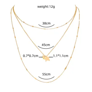 Gedetailleerd overzicht van de gelaagde gouden sterrenketting met lengte en gewicht.