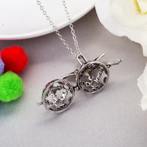 Vintage hollow angel wing aromatherapy ball necklace locket retro DIY jewelry accessory