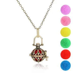 Vintage hollow aromatherapy ball pendant necklace with multi-color pompom refill options.