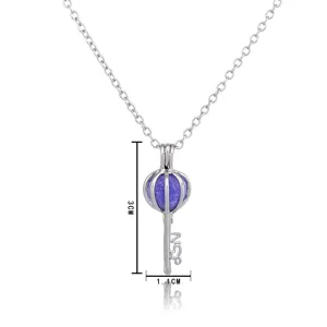 Close-up detail of the hollow key pendant necklace featuring a 3cm aromatherapy ball.